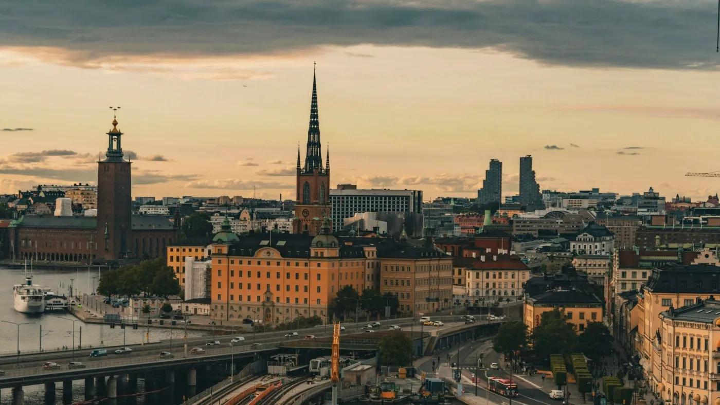 A view of Stockholm from the air with streets and traffic and a yellow sky